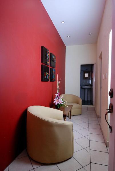 Hotel & Suites Galeria Morelia Quarto foto